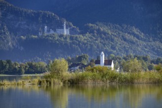 Forggensee near Füssen, behind it Waltenhofen and Neuschwanstein Castle, Ostallgäu, Allgäu, Swabia,