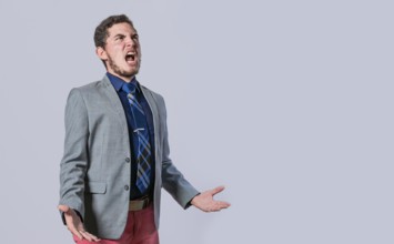 Man in suit screaming loud, Desperate man yelling over isolated background, Business man frustrated