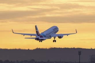 Passenger aircraft in front of a cloudy morning sky, sunrise, Eurowings, Baden-Württemberg,