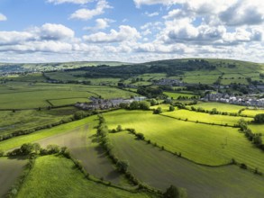 Farms and Fields over Cononley and River Aire from a drone, Keighley, North Yorkshire, England,