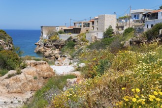 A Mediterranean village on the coast with flowers and rocky landscape, Mezapos, Mani, Peloponnese,