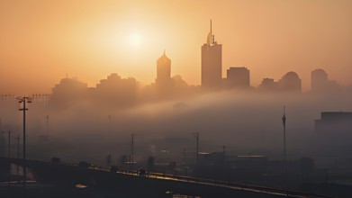 Cityscape emerging from a dense enveloping fog in sunrise and skyscrapers piercing the haze, AI