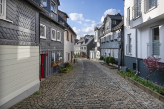 Cobbled old town alley with slate houses, Siegen, North Rhine-Westphalia, Germany, Europe