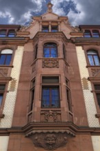 Multi-storey Art Nouveau bay window and roof end of a town house (1901), Haupstr. 86, Heidelberg,