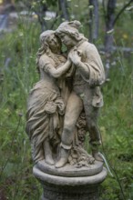 Couple as fountain figures in a garden, Bavaria, Germany, Europe