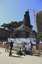 Addis Ababa, street scene in the city centre, statue of a lion in front of the National Theatre,