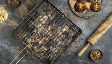 Empty grill grate with burnt remains on the grid, garden grill, AI generated, AI generated