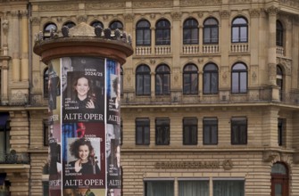 Historic advertising pillar, posters, programme for Alte Oper 2024-2025, Commerzbank, lettering,