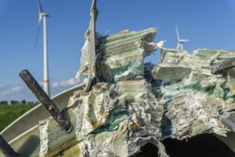 Close-up of a dismantled blade of a 23-year-old wind turbine, it consists of a mix of materials,