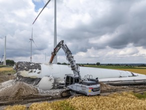 Demolished tower of a 20 year old wind turbine, in the Werl wind farm, 5 old Enercon E-66 turbines