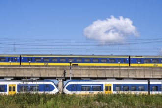 Trains of the Dutch railway, NS, Nederlandse Spoorwegen N.V., on a double-decker track, below local