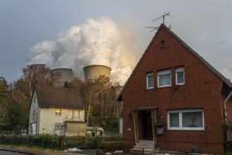 Auenheim village near the lignite-fired power station, RWE Power AG Niederaußem power station, near