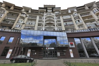 Bucharest, centre, building of Blom Bank France, in front of it car of the security company,