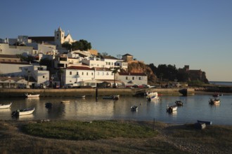 Ferragudo and Rio Arade Bay in the evening light, Algarve, Portugal, Europe