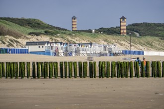 Beach huts, North Sea coast in Zeeland, called Zeeland Riviera, breakwater, made of wooden piles,