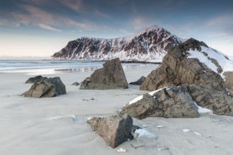 Winter evening mood at Skagsanden, stones on the beach near Flakstad, Flakstadøy, Lofoten,