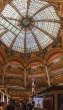 Magnificent dome with ornate glass and rich decorations, Paris