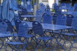 Catering, blue chairs and tables in a beer garden, outdoor catering, empty, closed