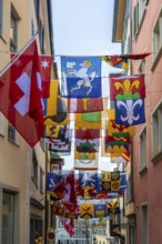 Augustinergasse with Swiss flags, Old Town, Zurich, Switzerland, Europe