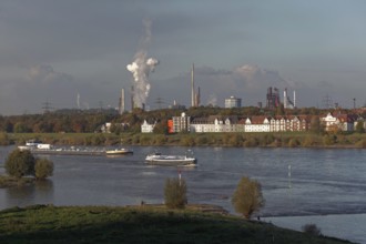 View of the Rhine with barges near Duisburg-Laar, ThyssenKrupp steelworks, Duisburg, North