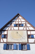 Historic half-timbered house with a sundial in the centre of Scheer, Danube Valley, Sigmaringen