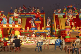 Market and amusement park in the evening in Luang Prabang, Laos, Asia