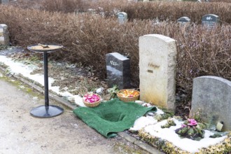 Prepared grave site for an urn burial with sand and flower baskets, urn grave, Riesa cemetery,