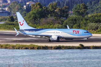 A TUI Boeing 737-800 aircraft with the registration G-TAWA at the airport in Corfu, Greece, Europe