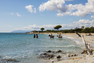 Lonely beach and riders, Spiaggia di Biderosa, Riserva Biderosa nature reserve, Orosei, Nuoro