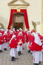 Confraternity of penitents gathering outside San Leonardo church, Enna, Siclly, Italy, Europe