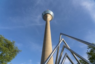 Rhine Tower television tower and energy pyramid on the banks of the parliament, state capital