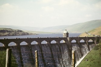 Water flowing over the dam wall from the reservoir, Pen y Garreg, Elan Valley, Rhayader, Powys,