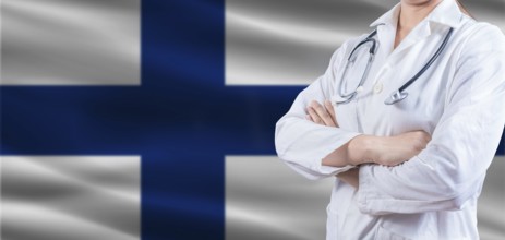 Doctor with crossed arms on Finland flag. Finland Health and Care concept. Female doctor on Finland