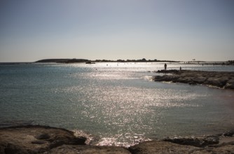 Glittering water surface on the beach of Elafonisi, west coast, Crete, Greece, Europe