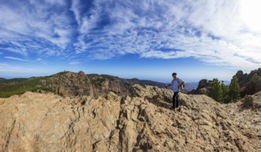 Hikers at the summit of El Campanario to Pico de las Nieves, Gran Canaria, Canary Islands, Spain,