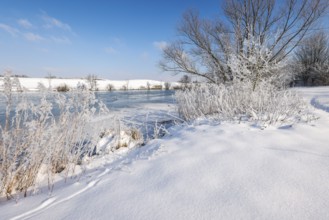 Hamm, North Rhine-Westphalia, Germany - Sunny winter landscape in the Ruhr area, ice and snow on