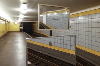 Mirrors on an underground platform at Hermannplatz station. The mirrors are used by the drivers for