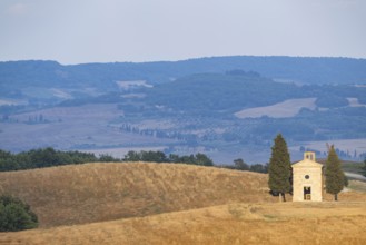 Cappella della Madonna di Vitaleta, Vitaleta chapel near Pienza at sunset in summer, Val d'Orcia,