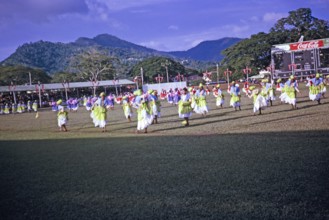 Colourful young female dancers, Port of Spain, Trinidad c 1962 independence pageant