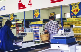 People shopping inside a PTC Kwiksave shop, Malawi, Southern Africa, 1989, Africa