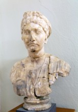 Carved marble portrait of aristocratic Roman woman in archaeology museum, Apollonia Archaeological