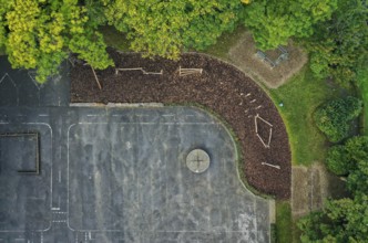 Mülheim an der Ruhr, North Rhine-Westphalia, Germany - Schoolyard unsealing, view from above of the