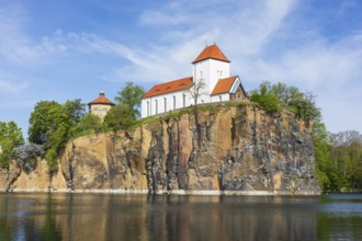 Mountain church and water tower on the Kirchberg, surrounded by the Kirchbruch quarry lake,