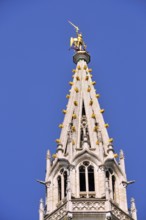 Gilded statue of the Archangel Michael fighting the dragon, the patron saint of the city of