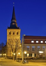 Market square with St Peter and Paul Church and community centre in the evening, Old Town,