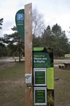 Parking meter in Forestry Commission land, Rendlesham Forest, Suffolk, England, United Kingdom,