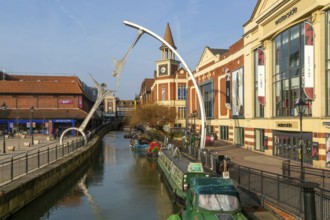 Narrow boats River Witham waterside shopping centre, Lincoln, Lincolnshire, England, UK -