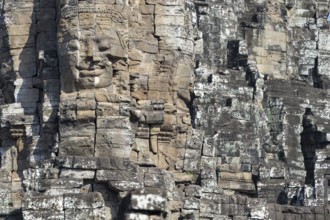 Panoramic image of giant stone-carved faces of the Bodhisattva Lokeshvara, also known as