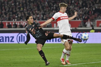 Jamal Musiala FC Bayern Munich FCB (42) against Finn Jeltsch VfB Stuttgart (29) MHPArena, MHP Arena