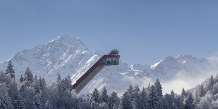 Mountain panorama over the Freibergsee in winter, near Oberstdorf, behind the Heini-Klopfer ski